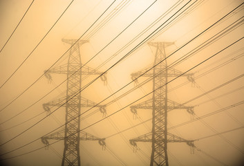 Electric towers. Sepia toned background