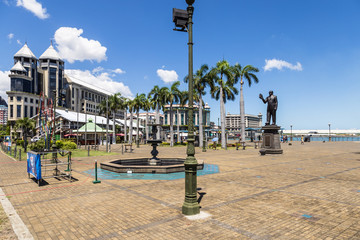 Port Louis waterfront in Mauritius capital city - obrazy, fototapety, plakaty