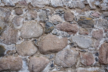 Texture of rocks and boulders. Colored stone background.