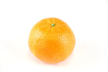single fresh tangerine isolated on white background