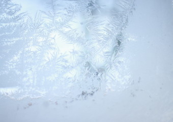 tracery of frost on window. winter miracle