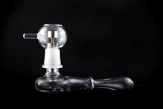 Weed glass pipe isolated on black background