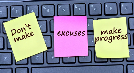 The words Don't make excuses make progress on notes