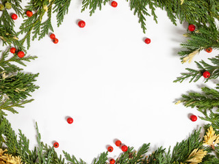 Fototapeta na wymiar Christmas background border with evergreen fir tree and berries