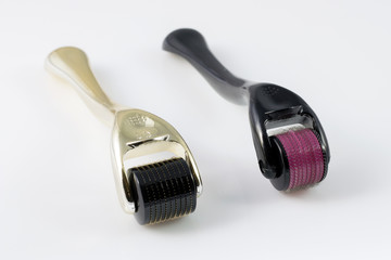Two derma rollers for medical micro needling therapy. Tools also known as: Derma roller, mesoroller, meso-roller, mesopen.