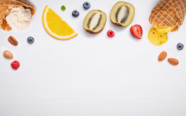 Cones and colorful various fruits raspberry ,blueberry ,strawber