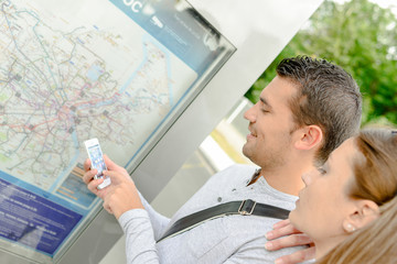 Couple planning their route