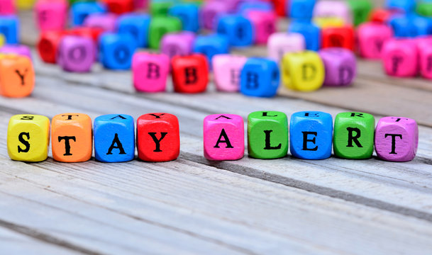Stay alert words on table - Powered by Adobe