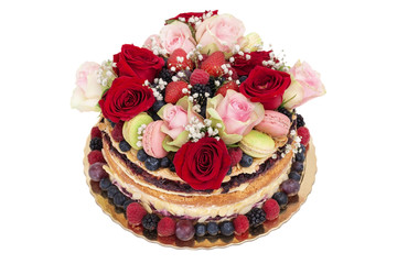 Obraz na płótnie Canvas Delicious fruit cake with roses flowers.