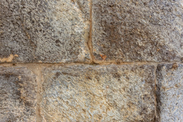Pattern and texture of the stone wall.