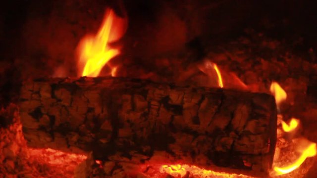 Beech Log burning - slow flames - close-up