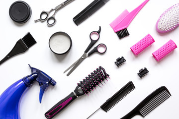 preparations for styling hair on white background top view