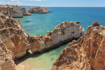 Boats in the sea on holiday with tourists.