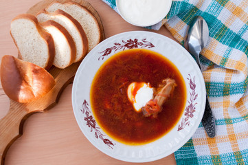 A plate of delicious beet soup with sour cream 