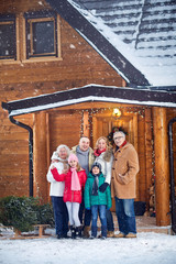 Portrait of smiling family outdoor on xmas.