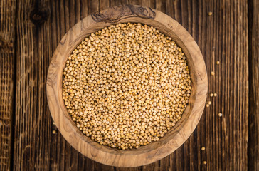 Mustard Seeds (selective focus) on vintage wooden background