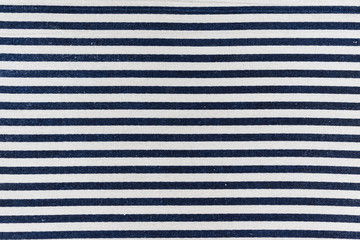 closeup of navy blue and white striped textile
