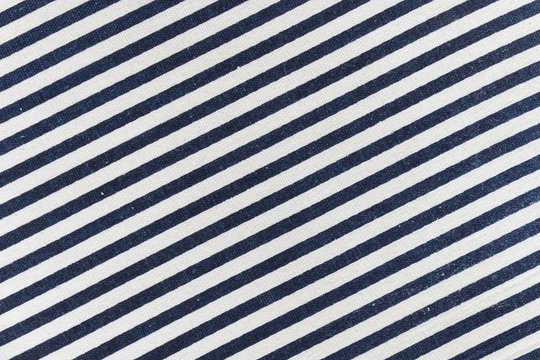 closeup of navy blue diagonal striped textile