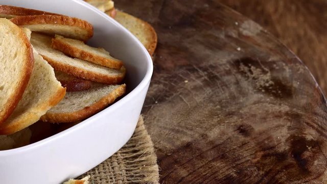 Portion of rotating Bread Chips as not loopable 4K UHD footage