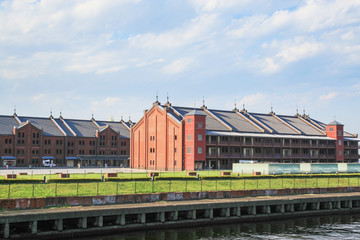 Fototapeta na wymiar renovated warehouses by the river