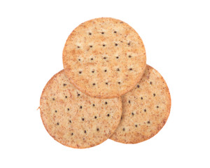 Pile of wheat crackers isolated on white backboard