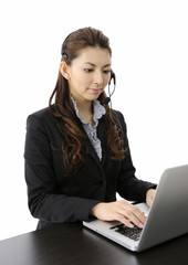 Businesswoman working on laptop