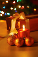 Gift boxes with balls on a christmas background