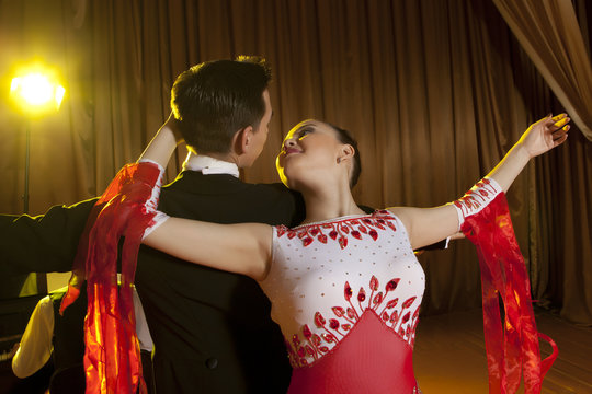 Beautiful couple in the active ballroom dance