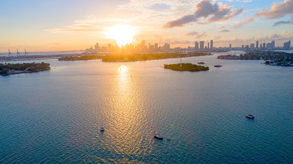 Miami, Florida Aewrial View of Downtown, Intercoastal Waterway,  Flagler, Star, Hibiscus, Palm Island, MacArthur Causeway, Port at Golden Hour Sunset