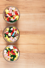 Heap of colorful medical pills and capsules, health care concept, copy space for text