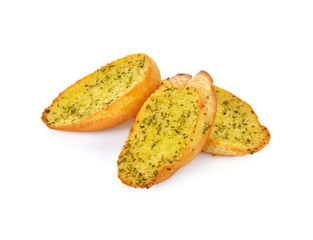 Garlic and herb bread slices on white background.