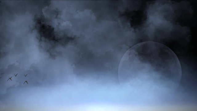 Birds on the background of the full moon.  Flock of birds flying on the background of the full moon.