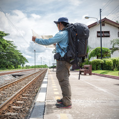 Traveler with backpack at the train station