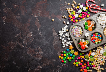 Obraz na płótnie Canvas Colorful candies and lollipops