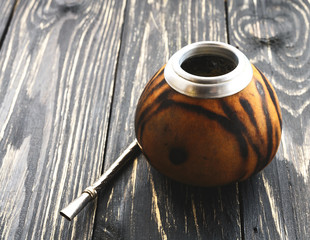 Yerba mate tea in a wooden mate calabash
