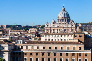 Fototapeta na wymiar view of St Peter's Basilica in Vatican and houses