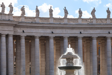 fountain and colonnade on piazza San Pietro