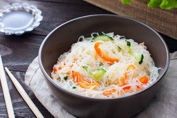 Funchoza salad with rice noodles with cucumber and pepper, horizontal