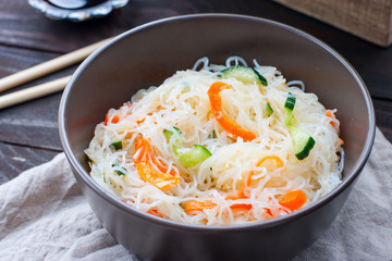 Funchoza salad with rice noodles with cucumber and pepper, horizontal
