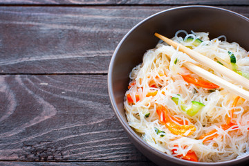 Funchoza salad with rice noodles with cucumber and pepper, horizontal