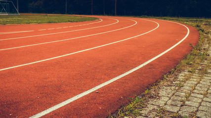 Fototapeta premium Red running track in stadium.