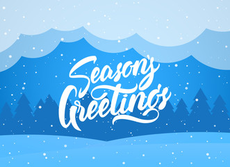 Fototapeta na wymiar Vector illustration: Handwritten elegant modern brush lettering of Season s Greetings on blue winter background.