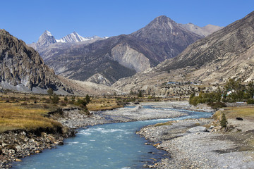 Majestic landscape and blue river in Himalayas mountains in Nepal