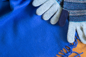 Fototapeta na wymiar Blue muffler and gloves