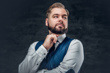 Thoughtful and elegant  business man wearing waistcoat.