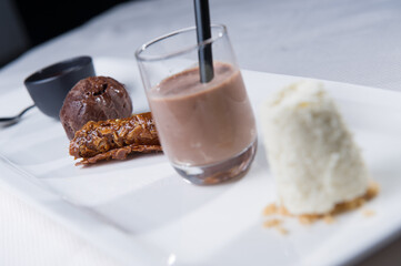 Five pieces dessert with milk, dark and white chocolate