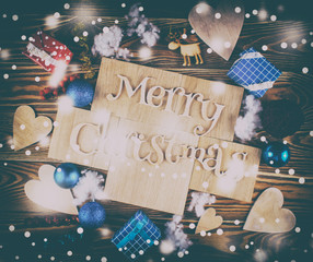 Wood inscription Merry Christmas on wood board. 
