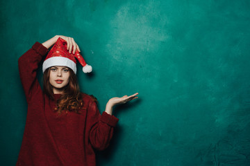 Portrait of a girl in glasses on a light background
