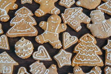 Christmas homemade gingerbread cookies on wooden table