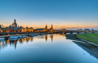 Fototapeta na wymiar Panorama of the famous skyline of Dresden with the river Elbe after sunset